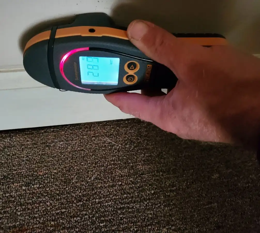Moisture detection at baseboard during Storm Damage Restoration in Dyersburg